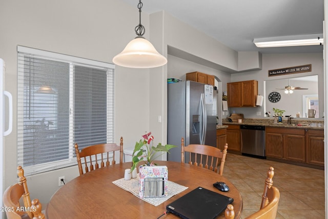 3905 E Derringer Way, Gilbert, AZ 85297 - dining area featuring light tile patterned floors and a ceiling fan