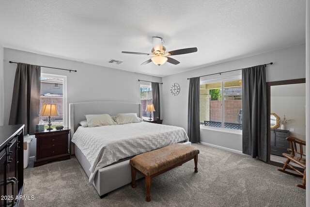 3905 E Derringer Way, Gilbert, AZ 85297 - bedroom with light carpet, a ceiling fan, and a textured ceiling
