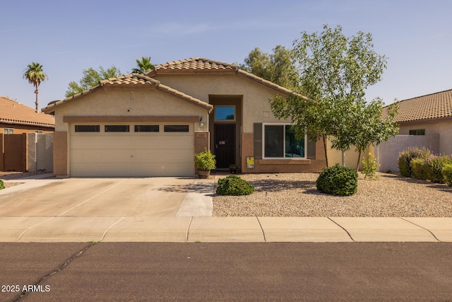 3905 E Derringer Way, Gilbert, AZ 85297 - mediterranean / spanish house featuring a garage, driveway, stucco siding, and a tile roof