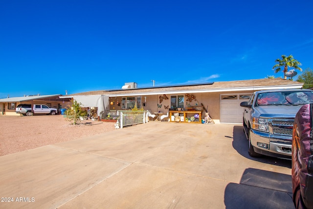 single story home with a garage