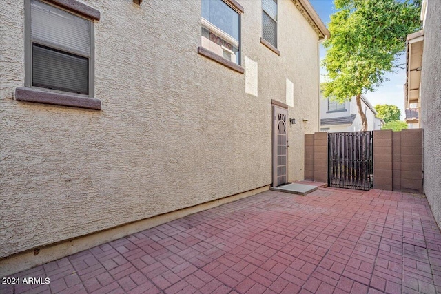 view of property exterior featuring a patio