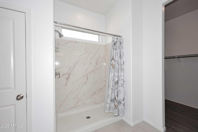 full bathroom with a stall shower