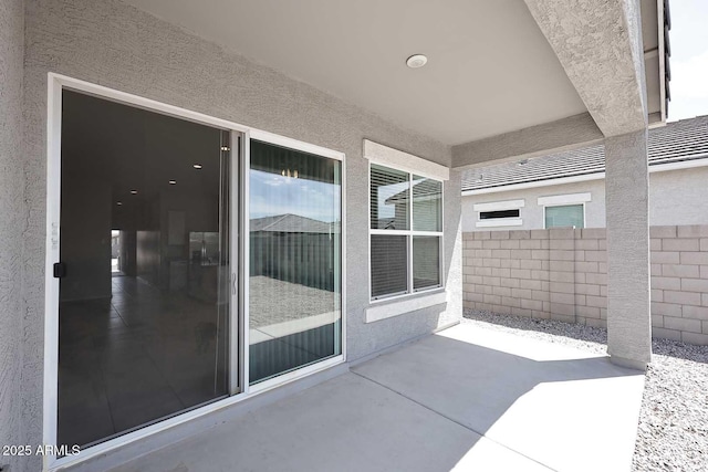 view of patio / terrace with fence