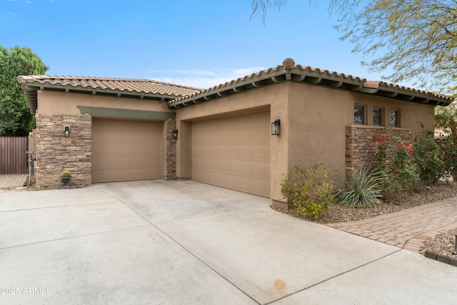 view of side of property featuring a garage