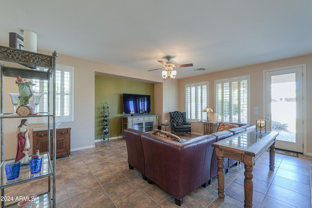 living room featuring ceiling fan