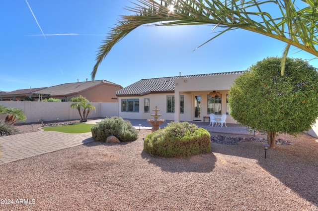 back of property featuring a patio area