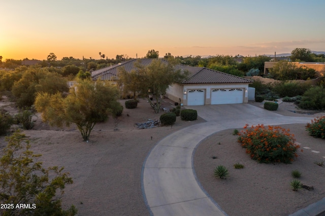 view of front of home with a garage