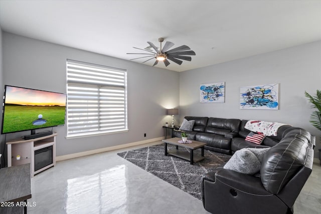 living room featuring ceiling fan