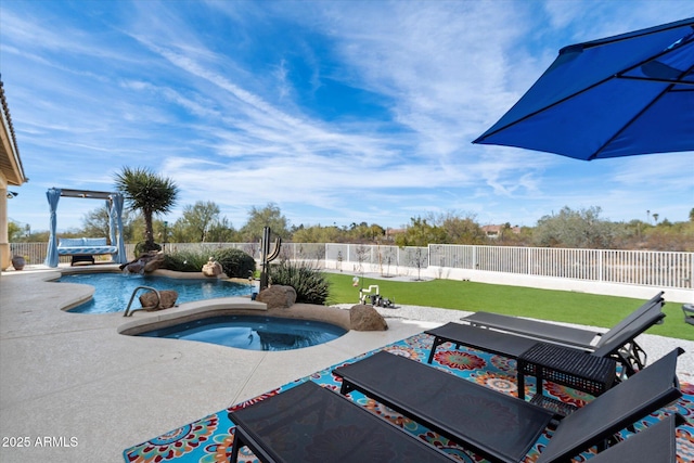 view of swimming pool featuring a patio and a lawn