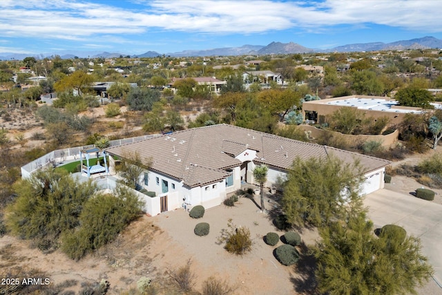 drone / aerial view featuring a mountain view