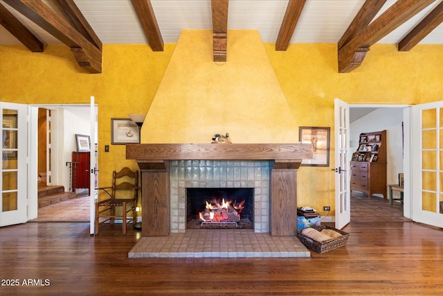 1614 Palmcroft Dr SW, Phoenix, AZ 85007 - living area with french doors, a brick fireplace, and wood finished floors