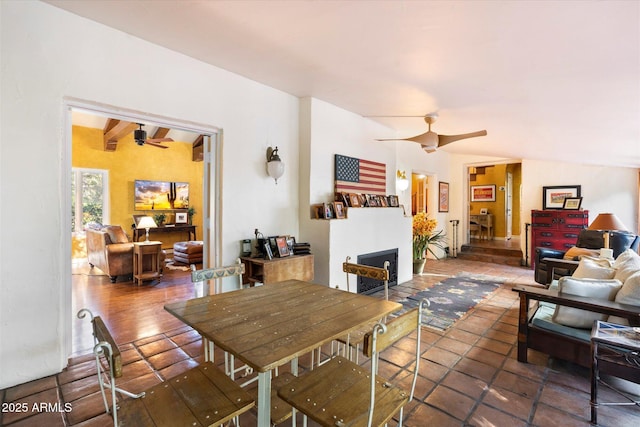 1614 Palmcroft Dr SW, Phoenix, AZ 85007 - dining room featuring wood finished floors, ceiling fan, and a fireplace