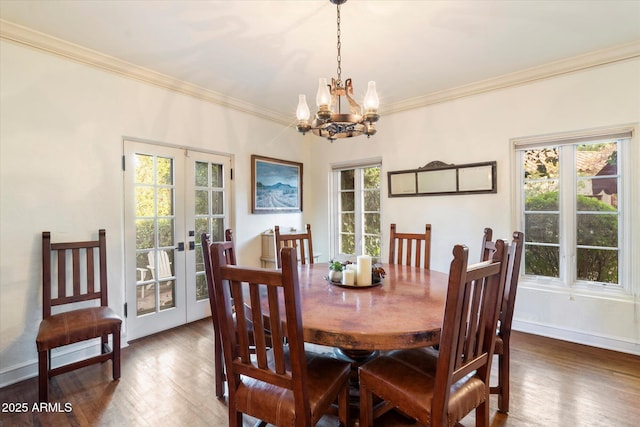 1614 Palmcroft Dr SW, Phoenix, AZ 85007 - dining area featuring french doors, crown molding, and wood finished floors
