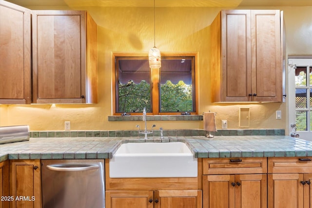 1614 Palmcroft Dr SW, Phoenix, AZ 85007 - kitchen with a sink, dishwasher, brown cabinetry, and a textured wall