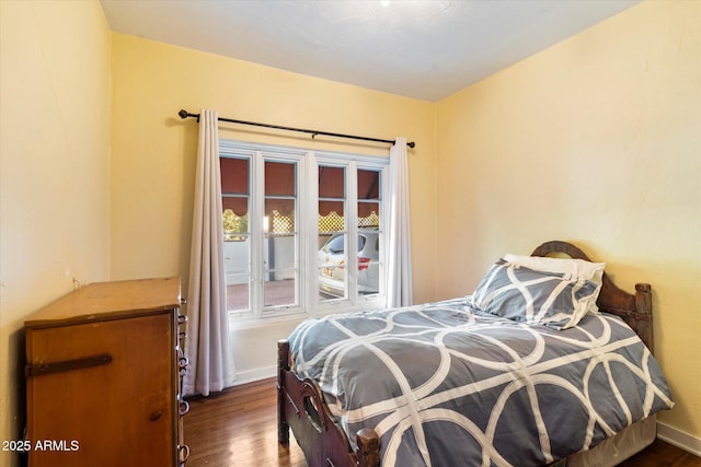 1614 Palmcroft Dr SW, Phoenix, AZ 85007 - bedroom with dark wood-style floors and baseboards