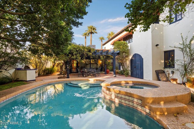 1614 Palmcroft Dr SW, Phoenix, AZ 85007 - view of swimming pool with a patio, a pergola, and a pool with connected hot tub