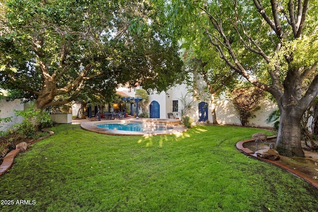 1614 Palmcroft Dr SW, Phoenix, AZ 85007 - view of yard with an outdoor pool, a patio, and a hot tub