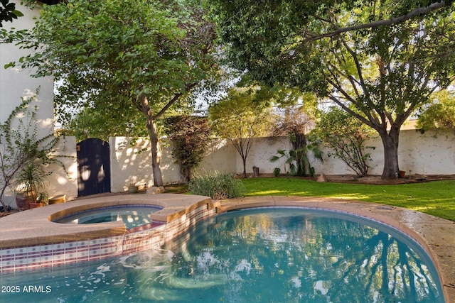 1614 Palmcroft Dr SW, Phoenix, AZ 85007 - view of swimming pool with a yard, a fenced backyard, and a pool with connected hot tub