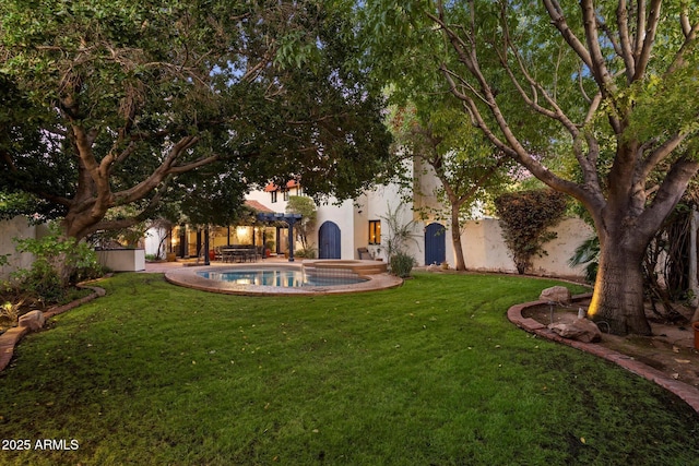 1614 Palmcroft Dr SW, Phoenix, AZ 85007 - view of yard featuring an outdoor pool and a fenced backyard