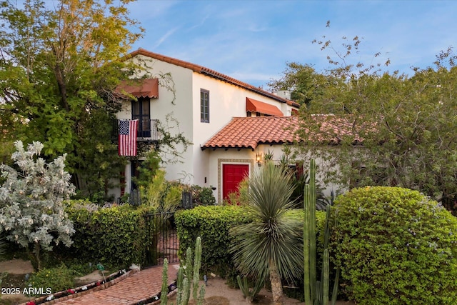 1614 Palmcroft Dr SW, Phoenix, AZ 85007 - mediterranean / spanish-style house featuring a tiled roof and stucco siding