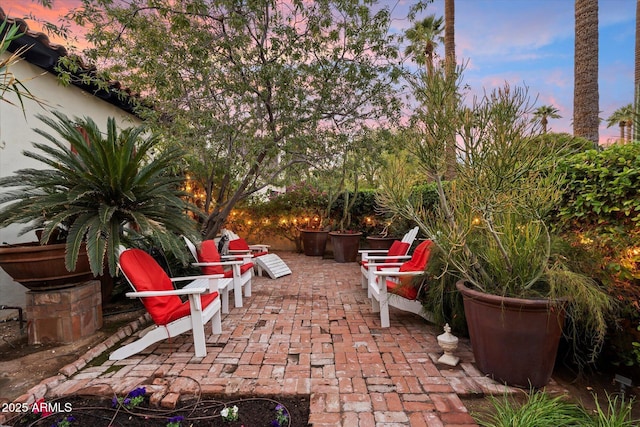1614 Palmcroft Dr SW, Phoenix, AZ 85007 - view of patio terrace at dusk