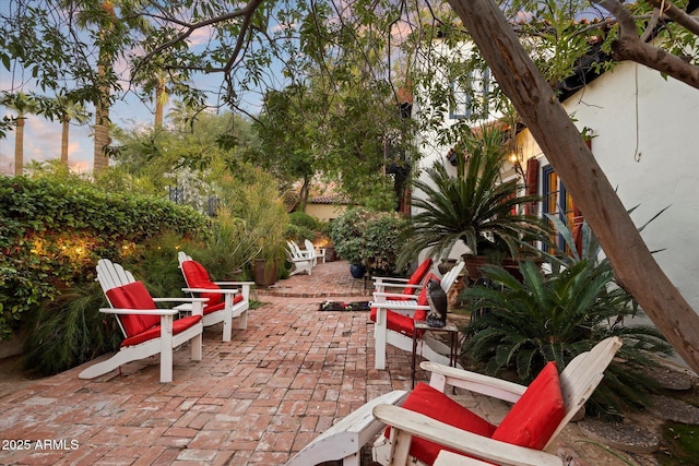 1614 Palmcroft Dr SW, Phoenix, AZ 85007 - view of patio terrace at dusk
