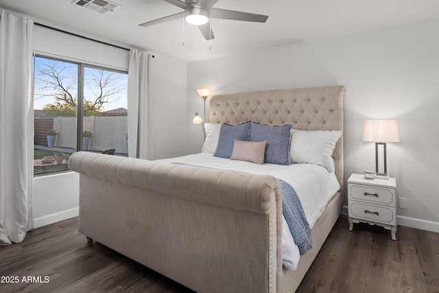 bedroom featuring visible vents, ceiling fan, access to exterior, baseboards, and wood finished floors