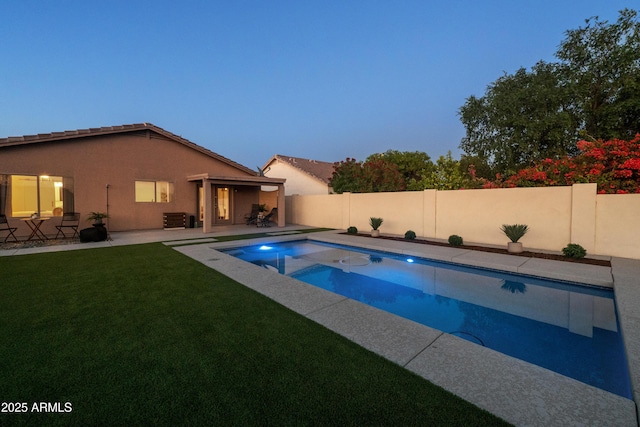 view of swimming pool featuring cooling unit, a fenced in pool, a patio area, a yard, and a fenced backyard