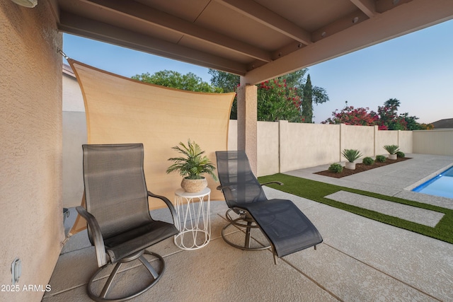 view of patio / terrace with a fenced in pool and a fenced backyard