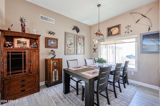 dining room featuring light hardwood / wood-style flooring