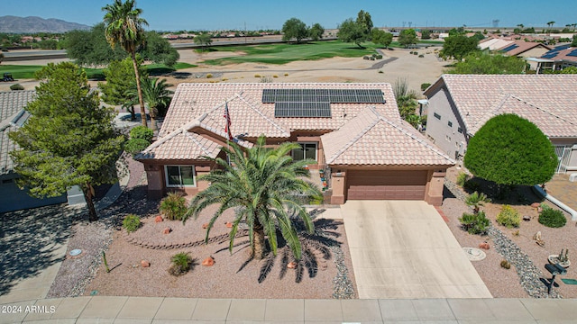 birds eye view of property featuring a mountain view