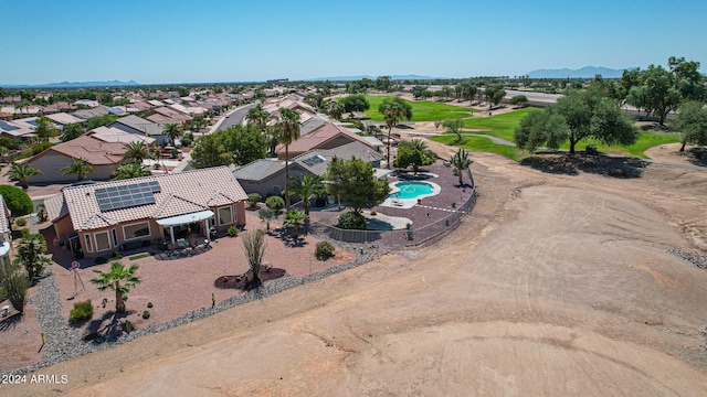 birds eye view of property with a mountain view