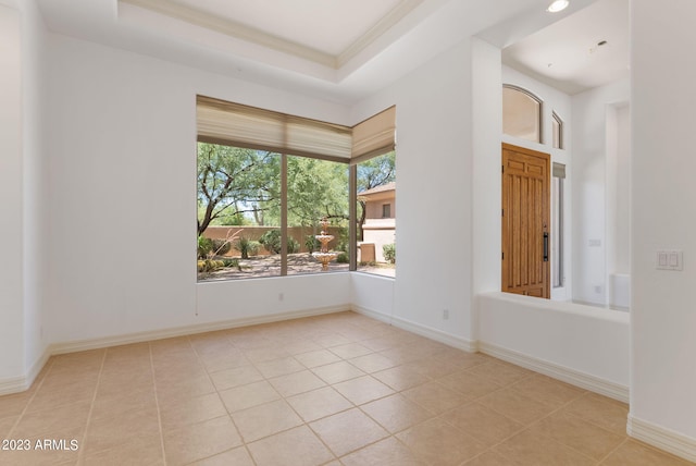 22463 N 54th St, Phoenix, AZ 85054 - empty room with tile patterned flooring, a raised ceiling, and baseboards