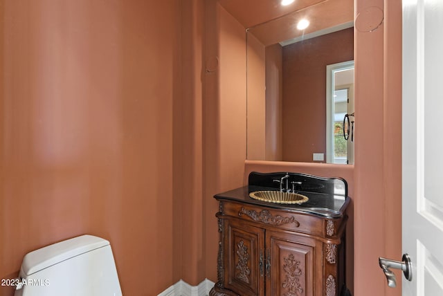 22463 N 54th St, Phoenix, AZ 85054 - bathroom with vanity, toilet, and recessed lighting