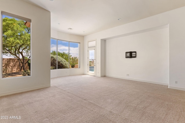 22463 N 54th St, Phoenix, AZ 85054 - carpeted spare room featuring plenty of natural light and baseboards