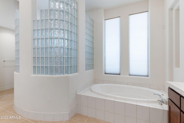 22463 N 54th St, Phoenix, AZ 85054 - bathroom featuring a garden tub, vanity, and tile patterned flooring