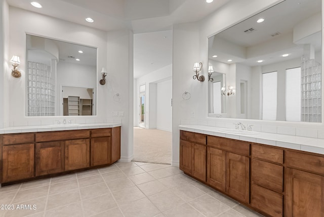 22463 N 54th St, Phoenix, AZ 85054 - bathroom with recessed lighting, two vanities, tile patterned floors, and baseboards