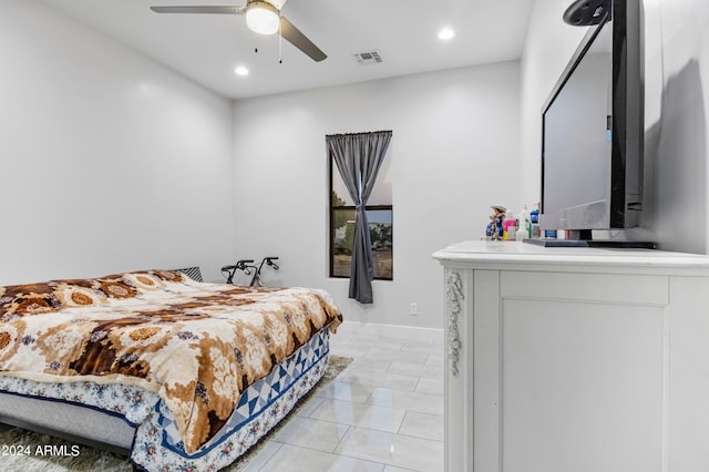 bedroom featuring ceiling fan and light tile patterned floors