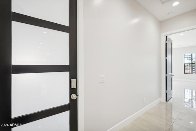 interior space featuring light tile patterned floors