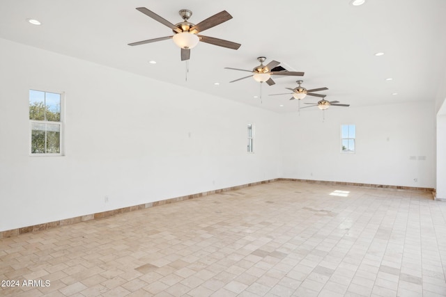 spare room with ceiling fan