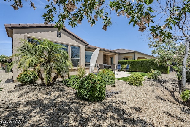 841 E Farmers Ln, Queen Creek, AZ 85140 - back of property featuring stucco siding and a patio area