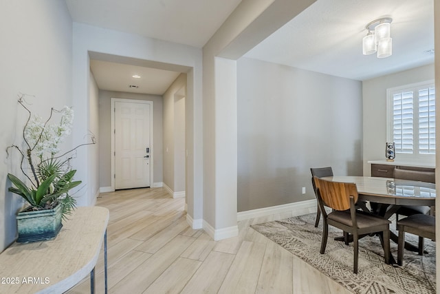 841 E Farmers Ln, Queen Creek, AZ 85140 - dining room with baseboards and light wood finished floors