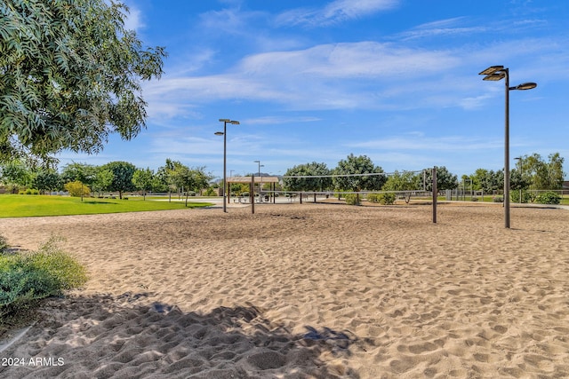 view of home's community featuring volleyball court