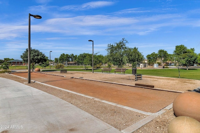 view of property's community featuring a lawn