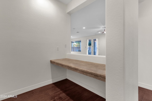 hall featuring dark wood-type flooring