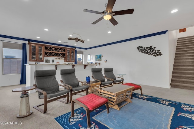 view of patio featuring a bar and ceiling fan