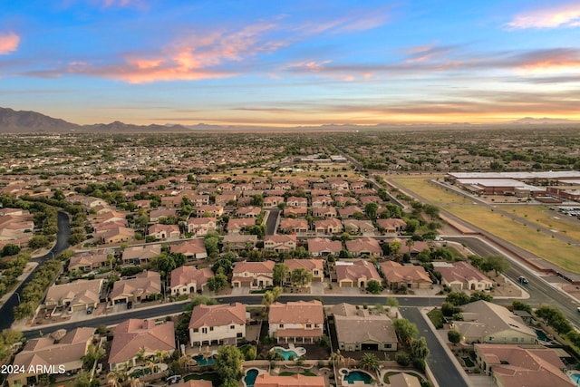 aerial view at dusk with a mountain view