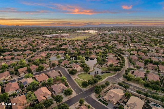 aerial view at dusk with a mountain view