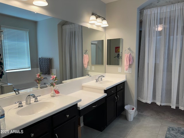 15301 W Moreland St, Goodyear, AZ 85338 - full bathroom with tile patterned floors, vanity, and a tub