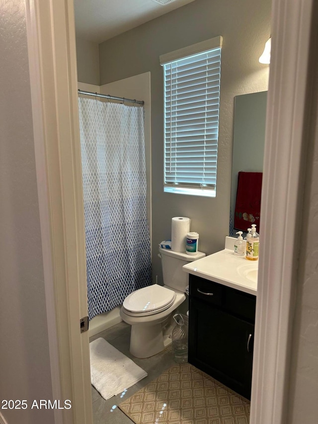 15301 W Moreland St, Goodyear, AZ 85338 - bathroom featuring toilet, vanity, and a shower with shower curtain